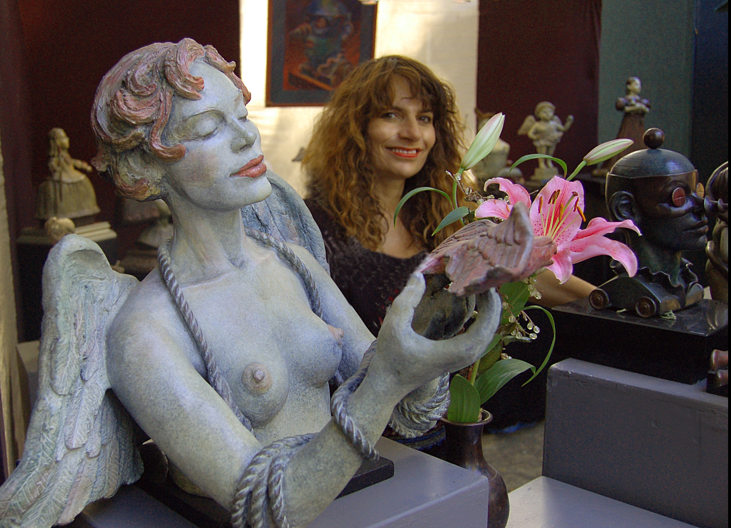 Claudia Cohen with her bronze sculptures in Park City, Utah